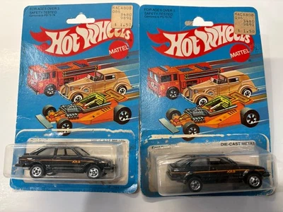 Lote de 2 autos Ford Escort 1982 Hot Wheels negro #3288 vintage Foto 1 de 4