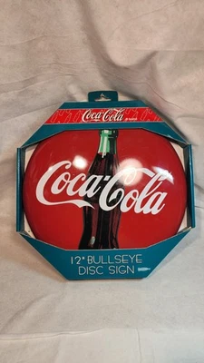 Letrero de metal vintage original de 12” clásico Coca-Cola Bullseye disco 1990, nuevo de stock Foto 1 de 4