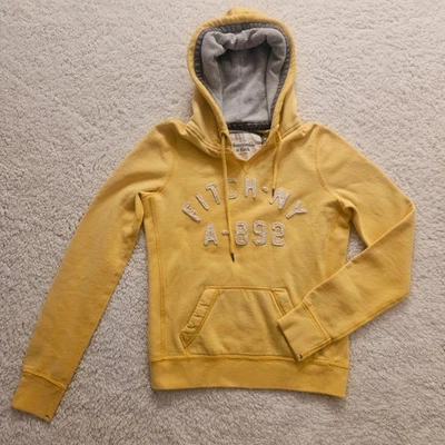 Pullover con capucha amarillo Abercrombie & Fitch - mediano para mujer - aspecto vintage Foto 1 de 4