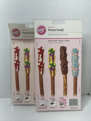 Wilton's Presents Molde Pretzel Bocadillos de Navidad Lote de 2 NUEVO Molde de Fusión Servir Foto 1 de 4