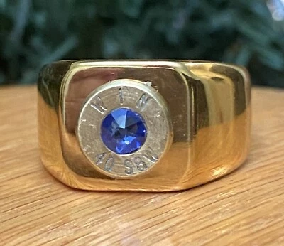 Carcasa bala de latón calibre 40 Winchester talla 11 anillo con cristal azul Foto 1 de 4