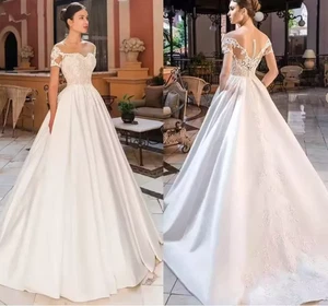 Vestido de novia manga corta marfil línea A corte tren encaje apliques vintage largo - Imagen 1 de 11