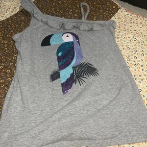 GIRL JUSTICE SEQUINS PARROT BIRD GRAY ONE SHOULDER RUFFLE TANK TOP SHIRT Size 16 - Picture 1 of 5