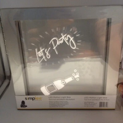 Botella de champán "Lets Party" 🍾 Caja de luz de movimiento LED Adesso botella plateada Foto 1 de 4