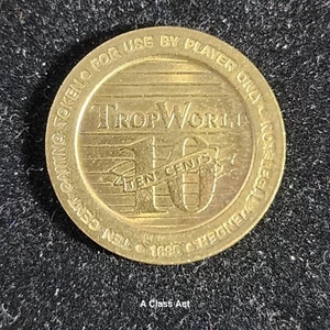 Token de juego Trop World Casino 10 centavos de Atlantic City. Our T5913 - Imagen 1 de 4