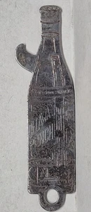 Antiguo abridor de botellas de metal publicitario perforador de Delaware ¡¡RARO!!! - Imagen 1 de 3