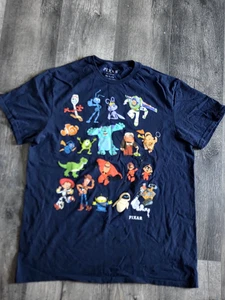 Pixar Disney Figuren Collage T-Shirt Gr. L Toy Story Monsters Inc Nemo - Bild 1 von 3