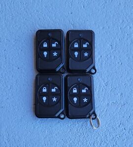 (LOT OF  4)  GE INTERLOGIX WIRELESS KEYFOB 600-1064-95R,  Pre-owned Tested.