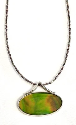 Lia Sophia “Illusion” Oval Shaped Silver Tone Necklace w/Mother of Pearl Stone - Image 1 of 3