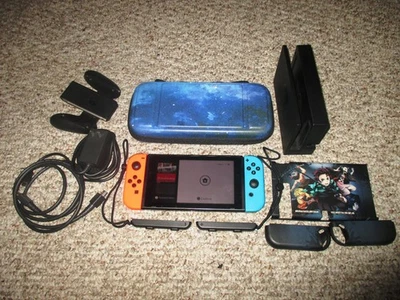 Nintendo Switch System Console w/Neon Red & Blue Joy-Cons + Dock,  Case+ - Image 1 of 4