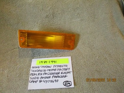 1987-1991 DODGE SHADOW SUNDANCE ЗАВОДСКОЙ OEM ПРАВОСТОРОННИЙ ПАРКОВОЧНЫЙ ОБЪЕКТИВ # 4328690 - Изображение 1 из 4