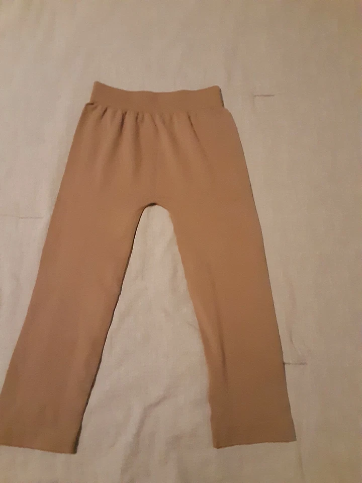 NIKIBIKI Women Seamless 3/4 Crop Capri Leggings, One Size, Tan - Image 1 of 2