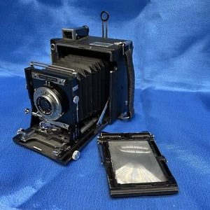 Fotocamera Graflex Speed Graphic 4" x 5" con obiettivo Kodak Ektar 127 mm 1:4,7 Supermatic - Foto 1 di 12