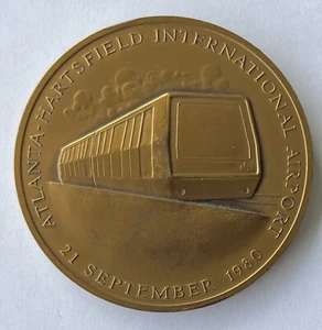 Westinghouse Atlanta Airport “Plane Train” Medallion -1980 - Picture 1 of 2