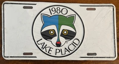 Lake Placid XIII Juegos Olímpicos de Invierno 1980 matrícula etiqueta Roni mapache vintage nuevo Foto 1 de 4