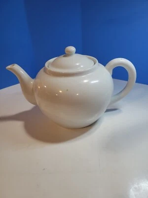 White Round Tea Pot With Porcelain Infuser And Lid 6.5" Tall 9" Wide - Image 1 of 4