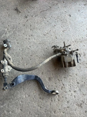 HONDA ORIGINAL OEM REAR BRAKE CALIPER ASSEMBLY TRX700XX TRX 700XX 2008-2009 - Image 1 of 3