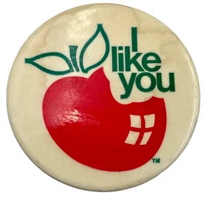 Vintage 1974 I Like You Pin Back Button Red Apple Bite Green Text Metal NY 2” - Picture 1 of 8