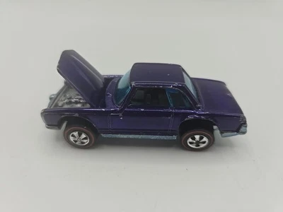 Mercedes Benz 280SL 1969 Hot Wheels Redline HK púrpura con interior oscuro. Foto 1 de 4