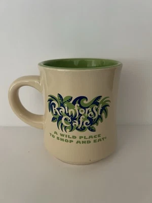 Taza de café de cerámica Rainforest Café "Un lugar salvaje para comprar y comer" 1999 vintage  Foto 1 de 4