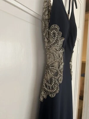 Vestido de graduación Fabiana de diseñador S7916. Forma de cuerpo de reloj de arena. Cuello en V. Foto 1 de 4