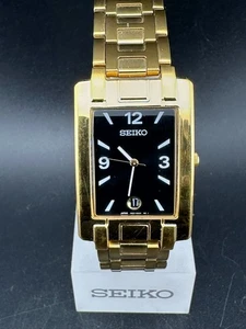 Reloj de cuarzo Seiko para hombre esfera negra tono dorado fecha 26 mm 7N32-0BL0 ¡Batería nueva! - Imagen 1 de 12