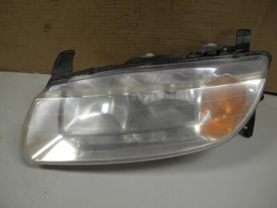Conjunto de faros Saturn L300 2001 faro izquierdo lado conductor Foto 1 de 4