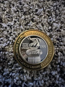 LIMITED EDITION TEN DOLLAR GAMING TOKEN ATLANTIS RENO, NV. 1999 - Picture 1 of 3
