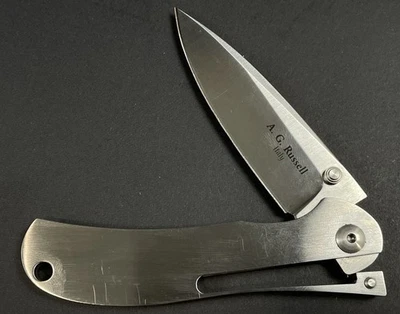 Cuchillo AG Russell Italy 4" cerrado N-690 marco de una mano hoja de bloqueo CASI COMO NUEVO Foto 1 de 3