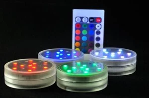 4 x RGB LED BASE WATERPROOF WITH REMOTE CONTROL 16 COLOURS BATTERY OPERATED … - Picture 1 of 2