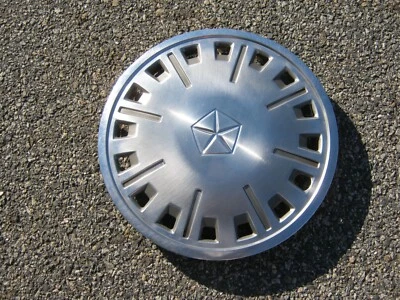 One factory 1983 to 1988 Dodge Aries Plymouth Reliant 13 inch hubcap wheel cover - Image 1 of 4