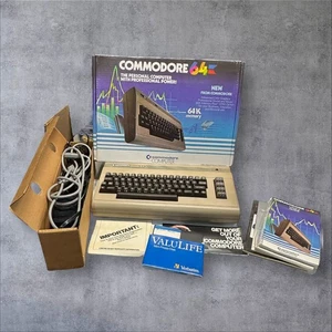 Clean Commodore 64 Tested/Powers On w/Cords , Paperwork - SN Matches Box - Picture 1 of 9
