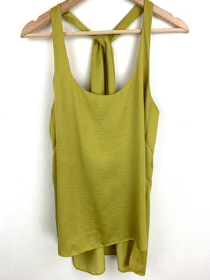 Camiseta sin mangas BCBGMaxazria verde citrón con lazo trasero sedosa talla M Foto 1 de 4