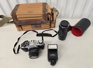 Canon AE-1 Program fotocamera reflex pellicola 35 mm con obiettivo, flash e custodia - Foto 1 di 23