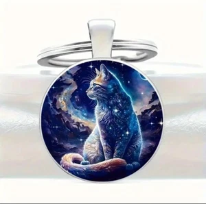 Schlüsselanhänger mit mystischem Katzenmotiv – Eine Reise durch die Galaxie - Bild 1 von 3