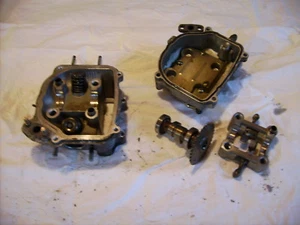 Testa cilindro 4 tempi leva basculante albero a camme SYM Orbit II 125 cc³ Sanyang AV12W  - Foto 1 di 2