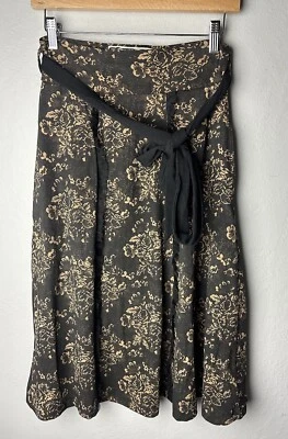 Falda midi Effie's Heart talla mediana con bolsillos con cinturón floral elástica Foto 1 de 3