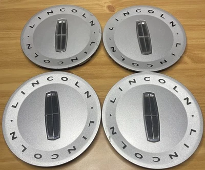 Juego de 4 tapas centrales Lincoln Town Car - OEM 5W13-1A096-AB - Usado Foto 1 de 4