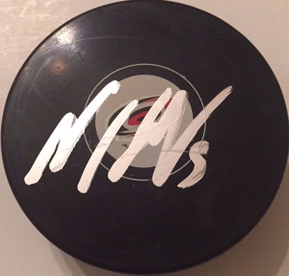 NOAH HANIFIN SIGNED CAROLINA HURRICANES PUCK W/CASE COA - Image 1 of 1