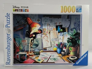 Ravensburger Disney Pixar Movies 1000 pc Puzzle ARTIST'S DESK 🌟 COMPLETE 🌟 EUC - Picture 1 of 6
