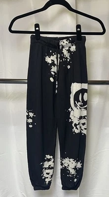 Pantalones deportivos Flowers by Zoe para niñas en blanco y negro con cordón de cuentas S Foto 1 de 4