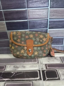 Dooney & Bourke Coated Canvas Stars Flap Wristlet - Picture 1 of 10