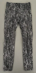 Leggings ajustados Athleta para mujer talla pequeña negros grises bolsillos para esconder atléticos - Imagen 1 de 9