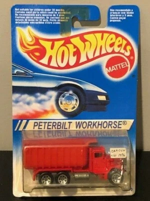 Camión de volteo Hot Wheels Peterbilt Workhorse, tarjeta de México, rojo, #100, tarjeta azul Foto 1 de 2