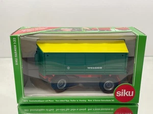 SIKU 2872 WELGER TWO SIDED TIPPER TRAILER W. AWNING -GREEN 1:32- GOOD IN  BOX - Picture 1 of 6