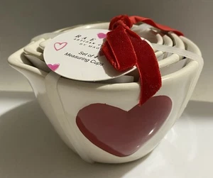 Rae Dunn Set Of 4 Ceramic Measuring Cups White And Puffy Red Hearts - Picture 1 of 2