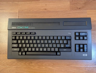 Computer musicale vintage Yamaha CX5M MSX con modulo FM SFG05 FM DX - Immagine 1 di 4