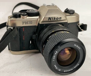Nikon FM10 kit fotocamera reflex pellicola 35 mm + obiettivo zoom 35-70 mm e custodia - testato - Foto 1 di 21