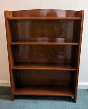 Bookcase in laquered wood. With four shelves 35.5" High x 27" Wide x 8.5" Deep