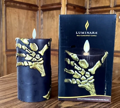 Luminara Negro y Dorado Esqueleto Manos Sin Llama LED Llama Móvil Pilar Vela Foto 1 de 4